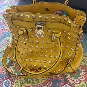 Michael Kors handbag bright yellow with fabulous studs on front
